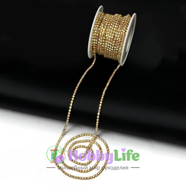 Стразы в бобине SS8М 2,4 мм*9 м, серебро хамелеон в золотой оправе