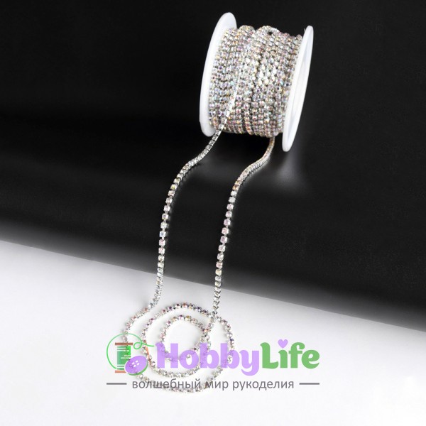 Стразы в бобине SS8М 2,4 мм*9 м, серебро хамелеон в серебряной оправе